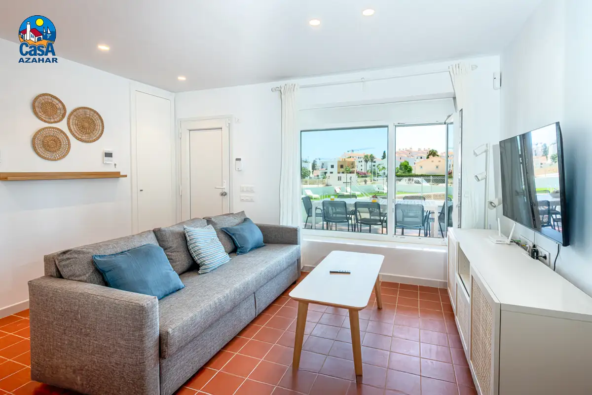 Salon avec sortie sur la terrasse dans une villa de Villas Sunset, Alcocéber